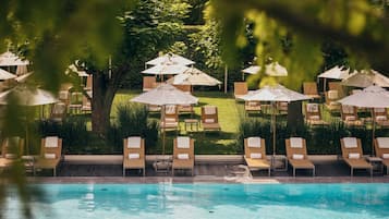 Seasonal outdoor pool, pool umbrellas, pool loungers