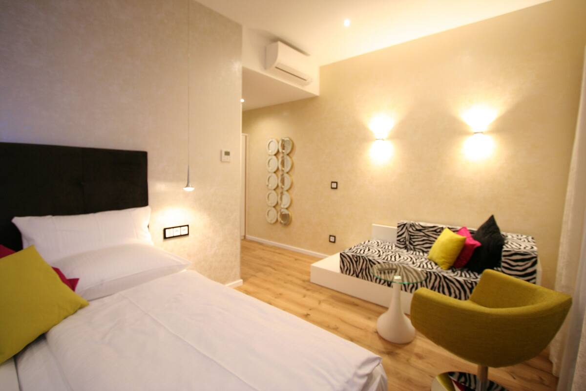 cuddle room | egyptian cotton sheets, premium bedding, minibar, in-room safe