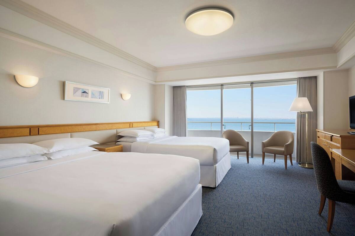 Chambre majestueuse, 2 lits doubles, vue sur la baie (Disney or Bay view) | Literie de qualité, couette en duvet, lit avec matelas à plateau-coussin