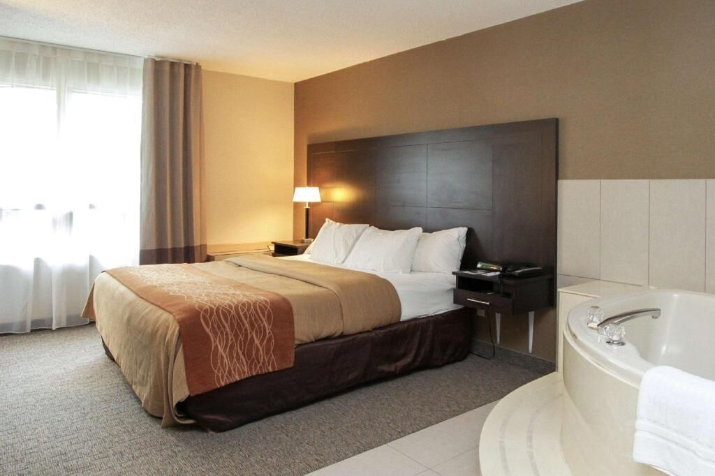 Premium bedding, desk, blackout drapes, iron/ironing board