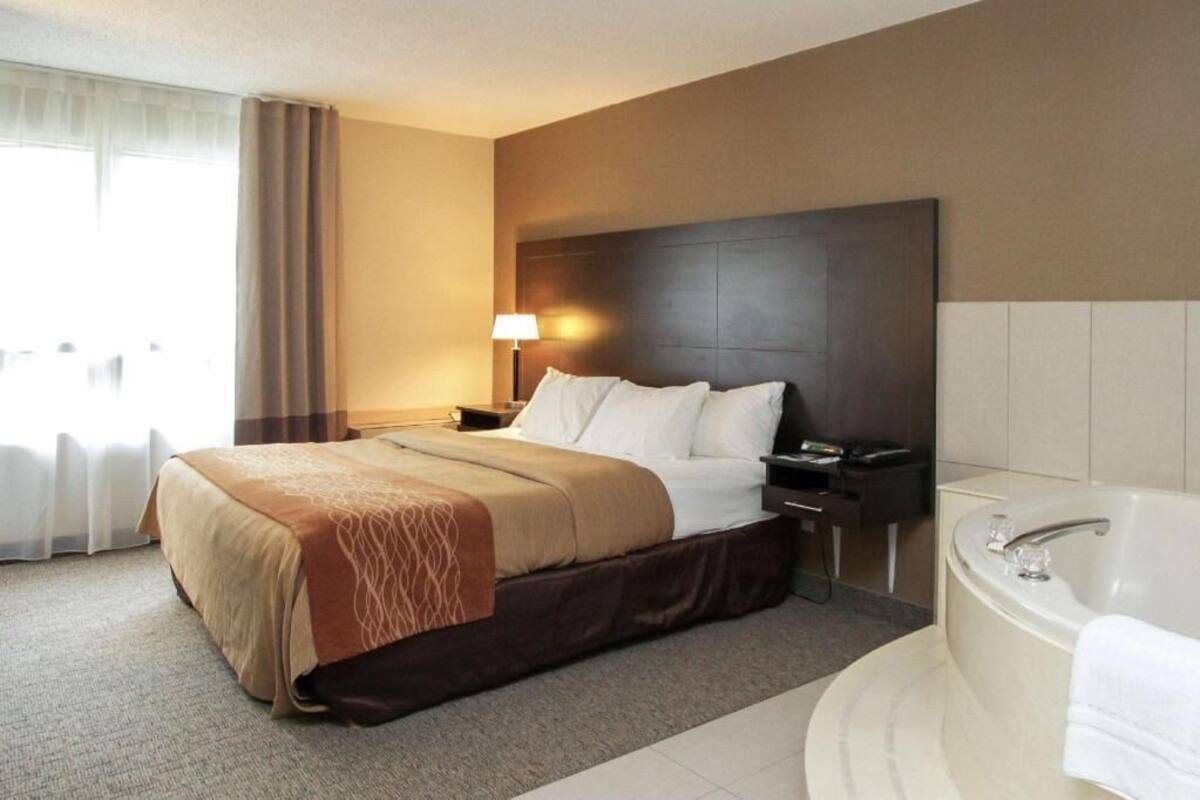 Premium bedding, desk, blackout drapes, iron/ironing board