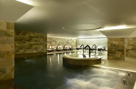 Couples treatment rooms, sauna, hot springs, Turkish bath. Porto Palácio Hotel by The Editory