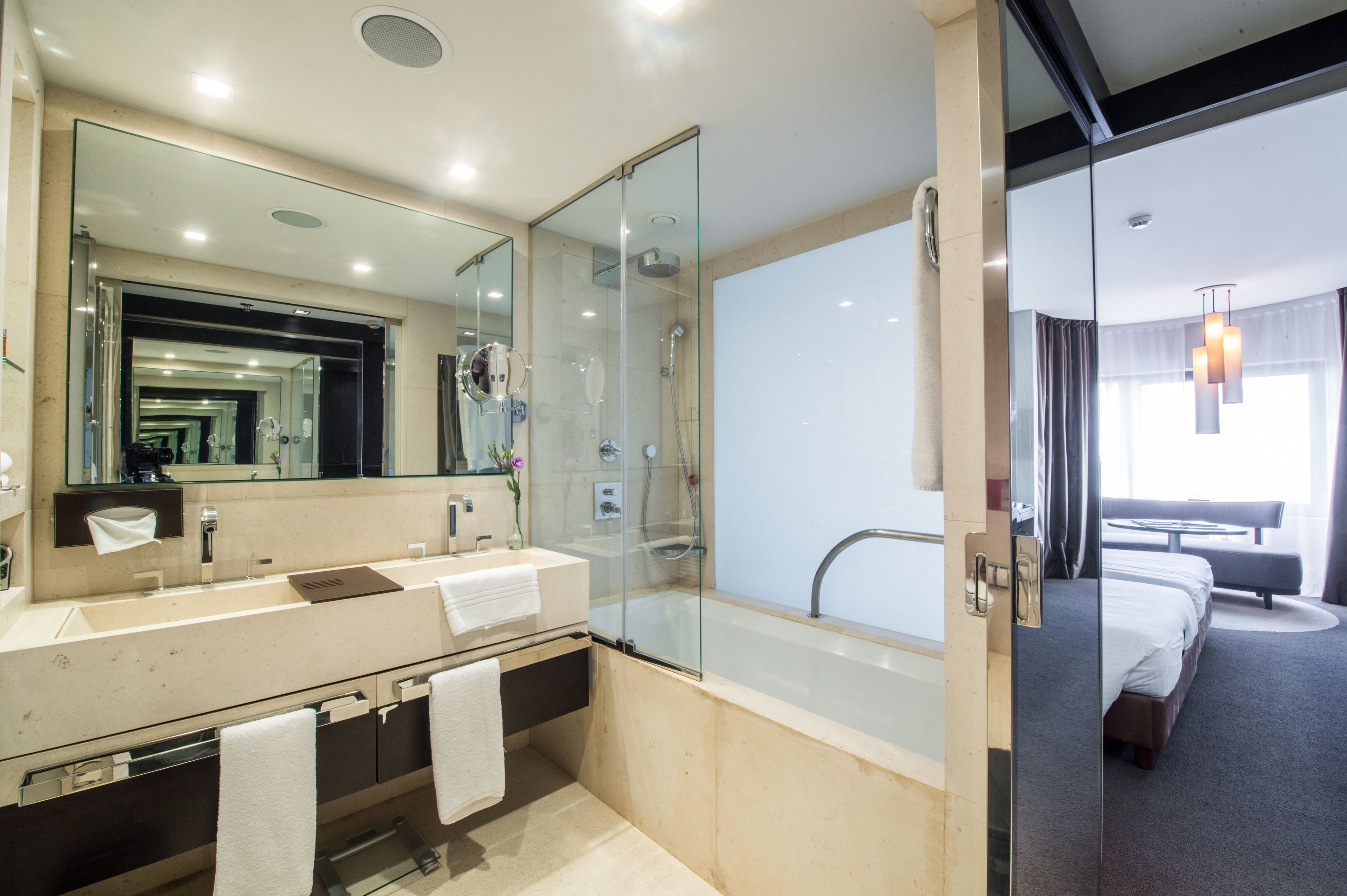 combined shower/bathtub, rainfall showerhead, designer toiletries