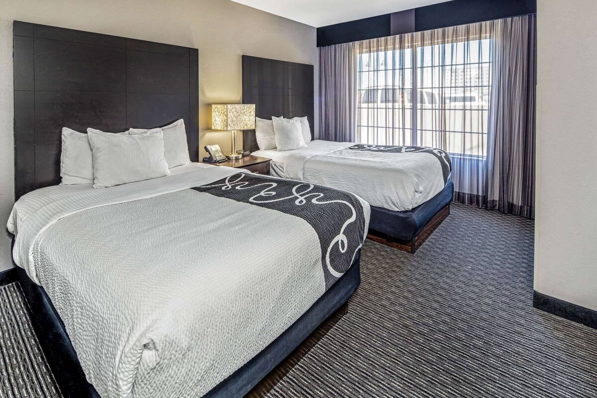 Premium bedding, desk, blackout drapes, iron/ironing board