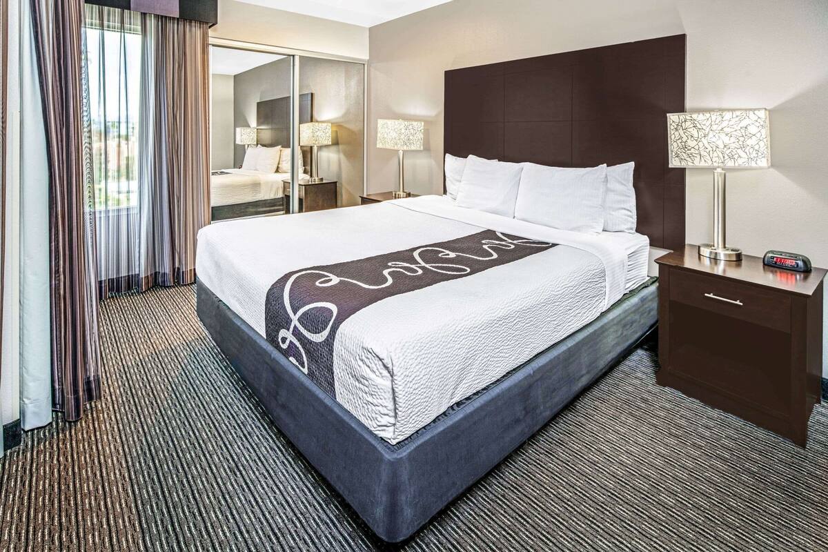 Premium bedding, desk, blackout drapes, iron/ironing board