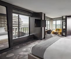 Premium bedding, down comforters, pillowtop beds, minibar