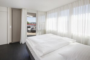 Sky Suite | Ropa de cama de alta calidad y caja de seguridad en la habitación 