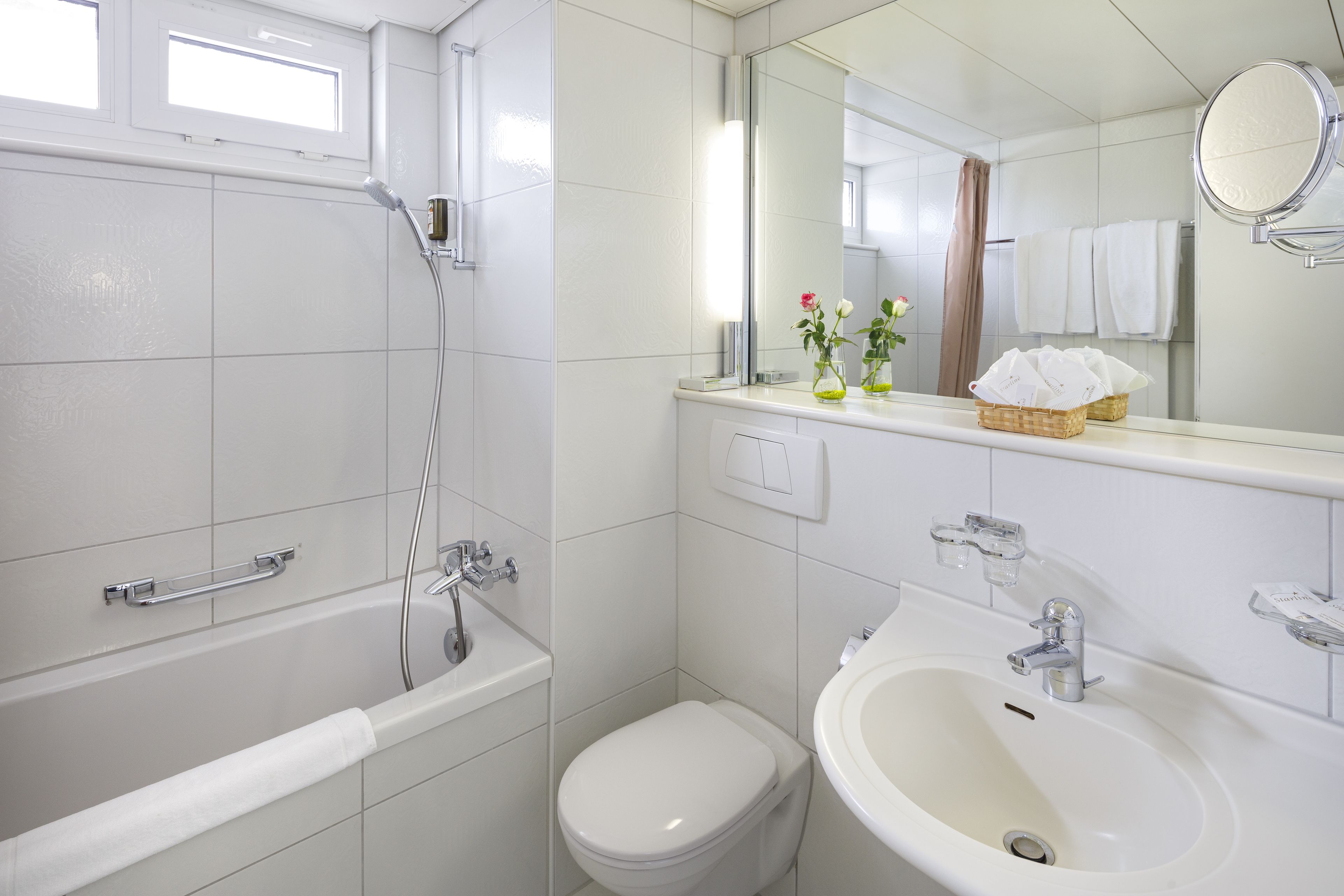 free toiletries, hair dryer, slippers, towels