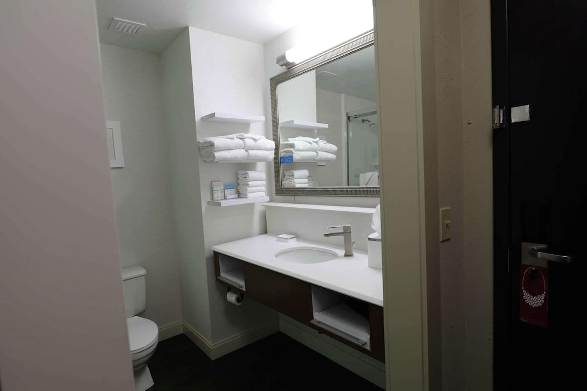 two queen beds non smoking | bathroom | free toiletries, hair dryer, towels