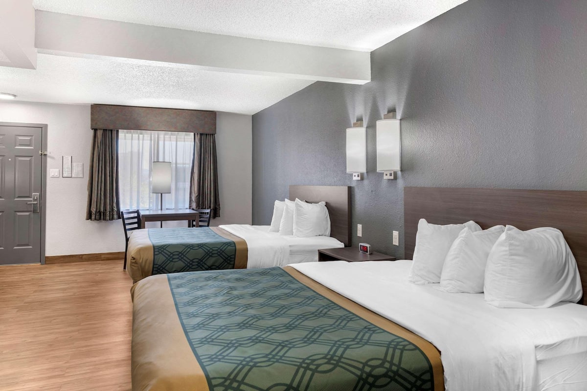 Down comforters, pillowtop beds, desk, blackout drapes