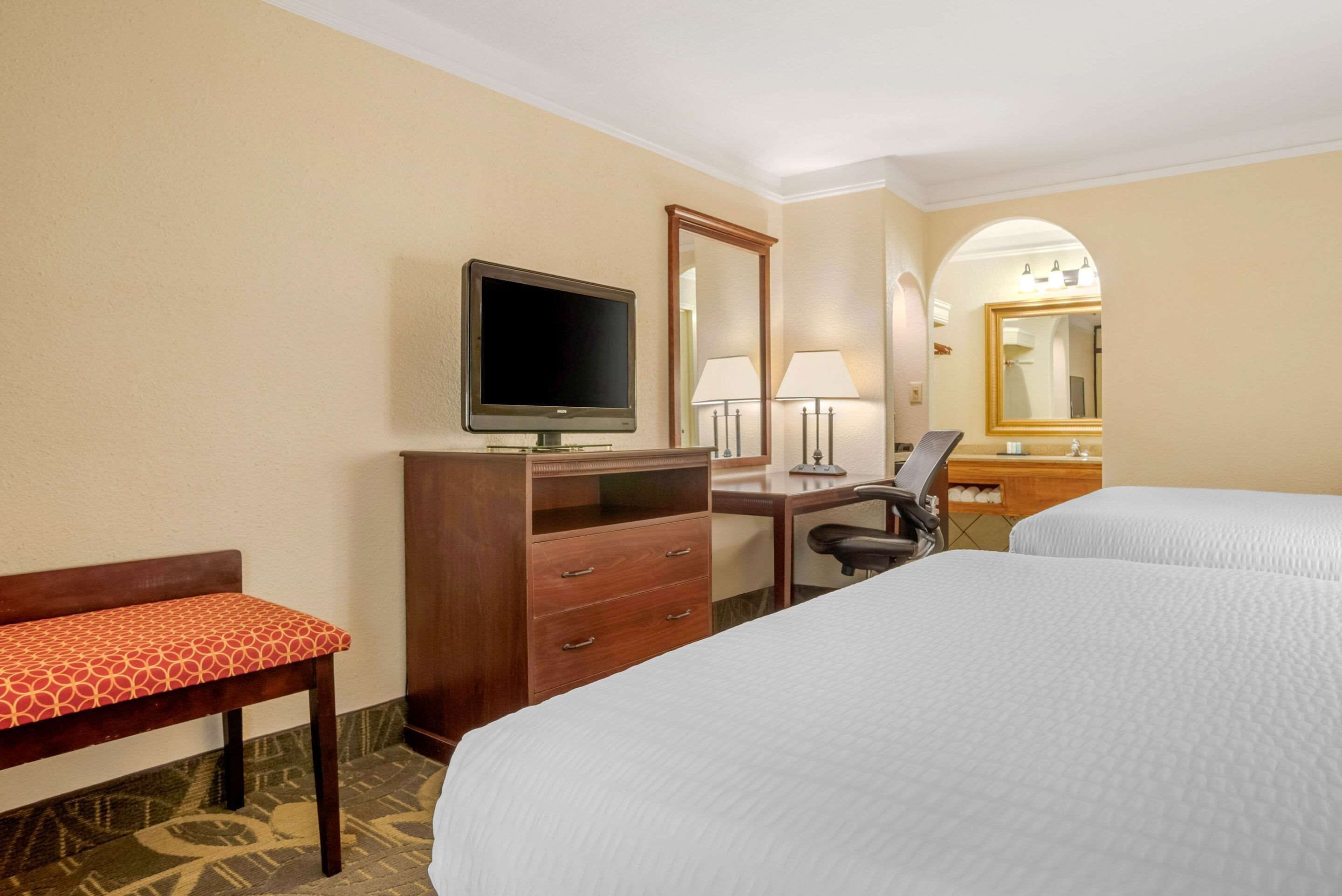 room, 2 queen beds, non smoking | desk, blackout curtains, iron/ironing board, free cots/infant beds