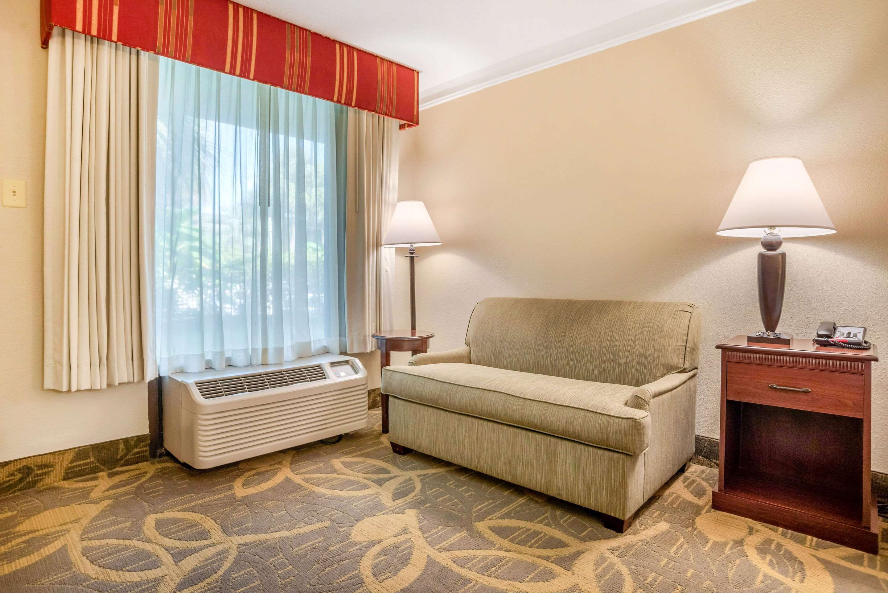 desk, blackout curtains, iron/ironing board, free cots/infant beds