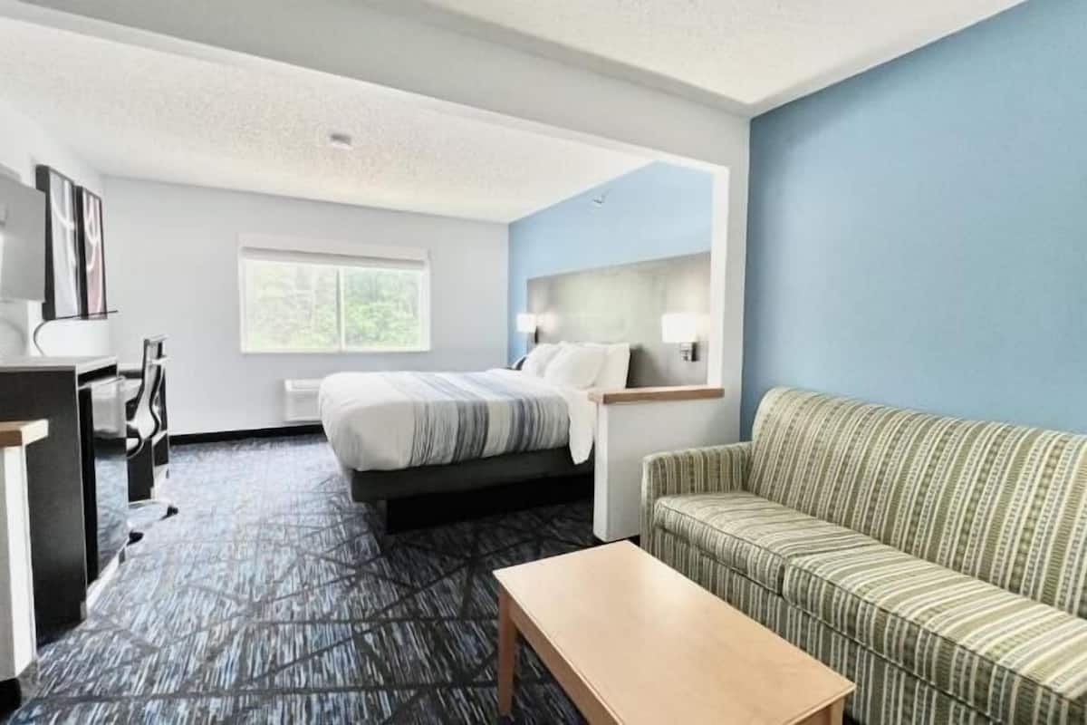 Premium bedding, pillow-top beds, desk, laptop workspace