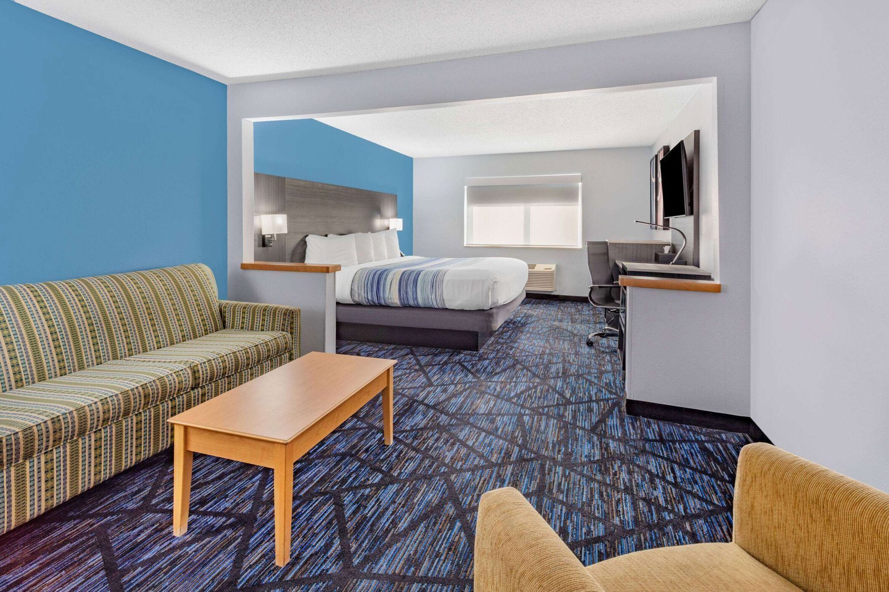 Premium bedding, pillow-top beds, desk, laptop workspace