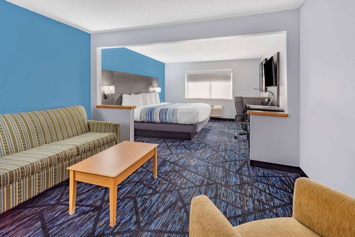 Premium bedding, pillow-top beds, desk, laptop workspace