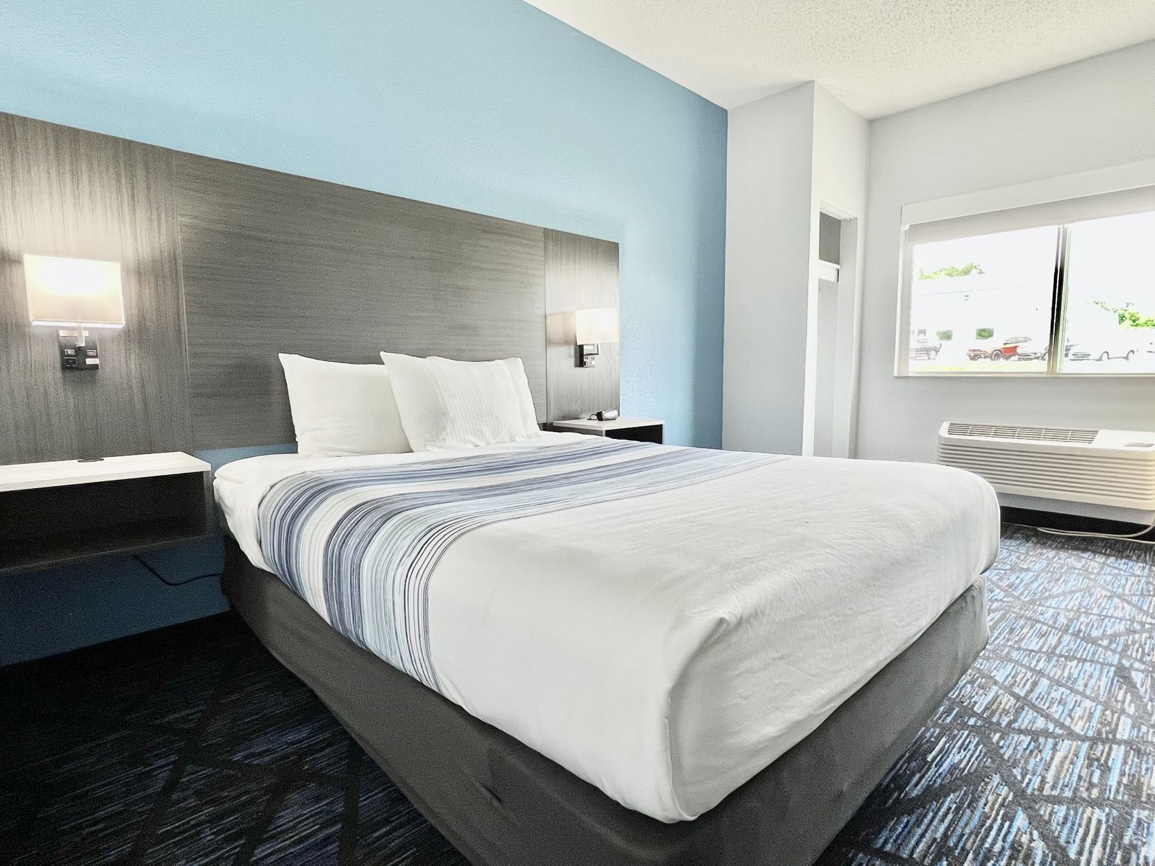 Premium bedding, pillow-top beds, desk, laptop workspace