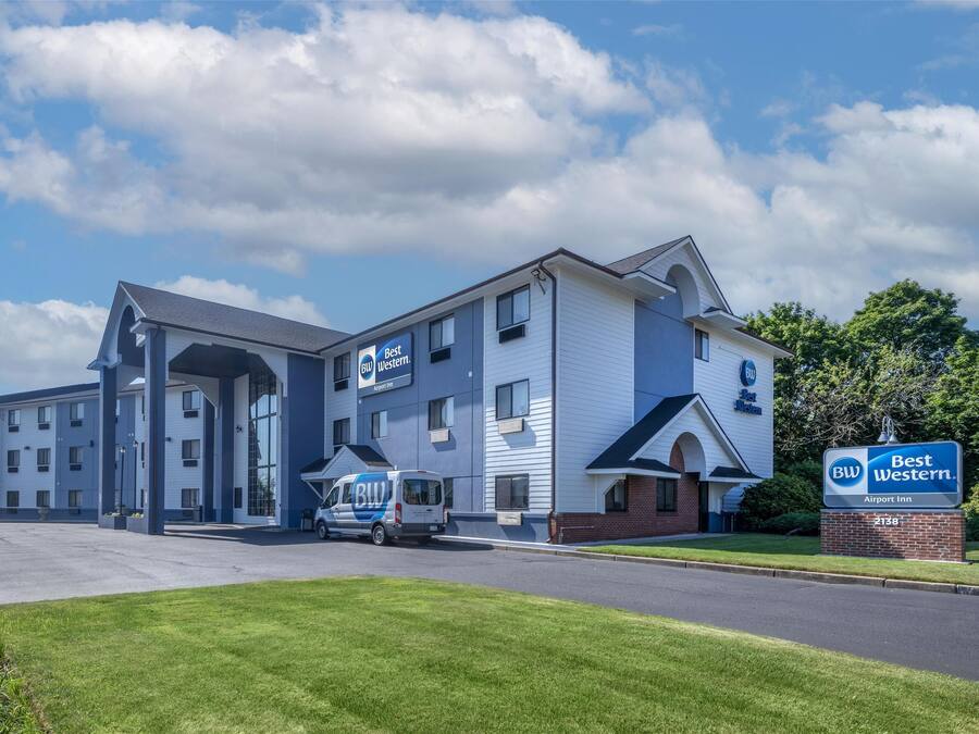A Best Western hotel with a modern design, featuring multiple rooms and a parking area.