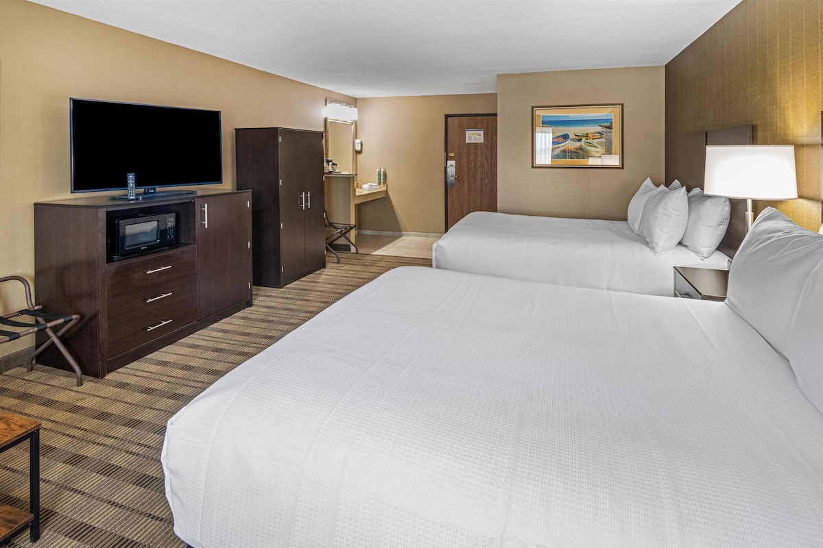 suite, 2 queen beds, non smoking, refrigerator & microwave (with sofabed) | in-room safe, desk, blackout curtains, iron/ironing board