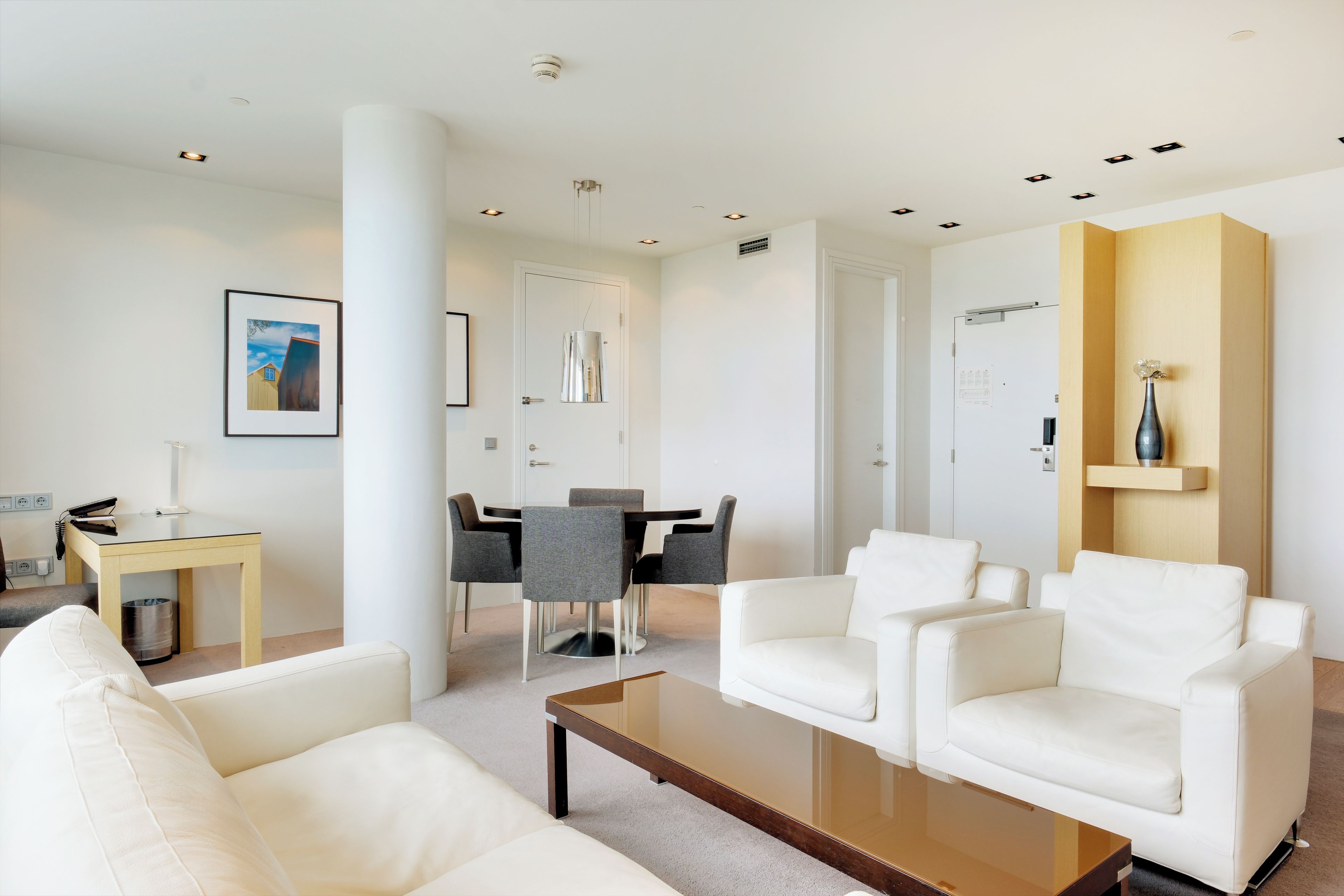 King Suite | Hypo-allergenic bedding available, down comforters, in-room safe, desk