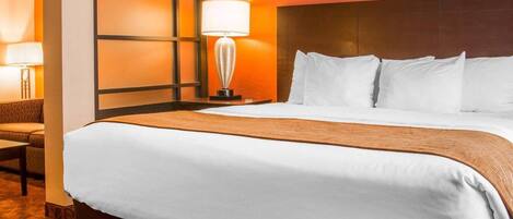 Suite, 1 Bedroom, Non Smoking (1 King and 2 Person Sofa Bed) | Pillowtop beds, desk, iron/ironing board, free cribs/infant beds