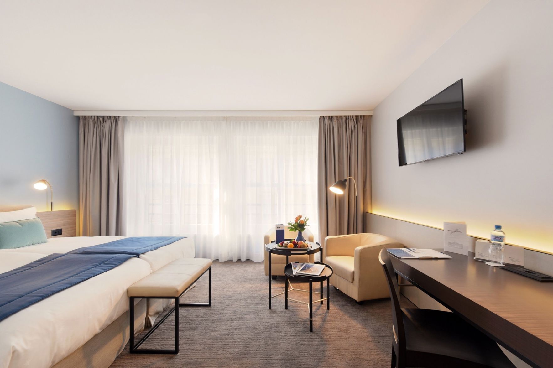 Ropa de cama de alta calidad y minibar 