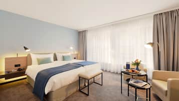 Ropa de cama de alta calidad y minibar