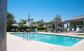 Outdoor pool, pool umbrellas, sun loungers