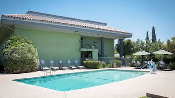 Outdoor pool, pool umbrellas, pool loungers