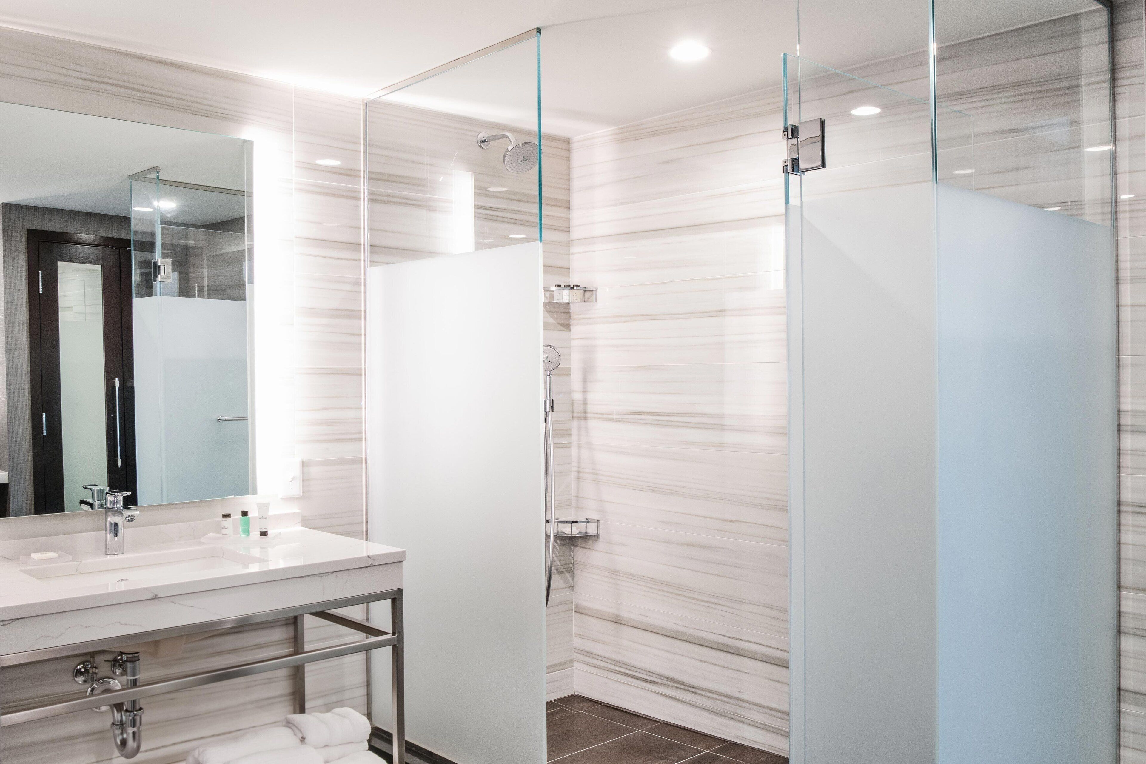 presidential suite, 1 king bed with sofa bed | bathroom | combined shower/bathtub, free toiletries, hair dryer, towels