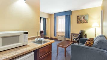 Suite, 1 King Bed, Non Smoking | In-room safe, desk, iron/ironing board, free cribs/infant beds