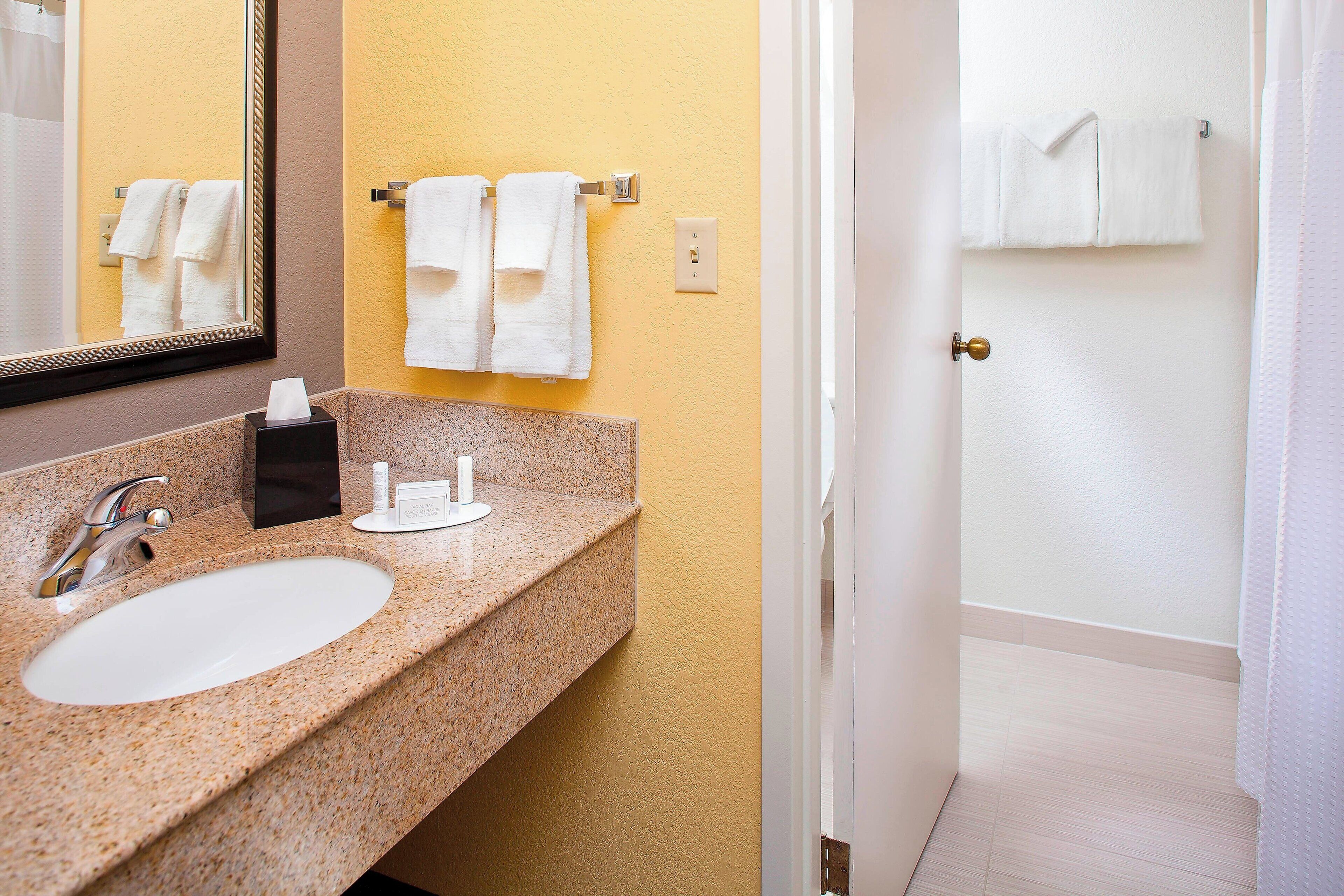 combined shower/bathtub, free toiletries, hair dryer, towels