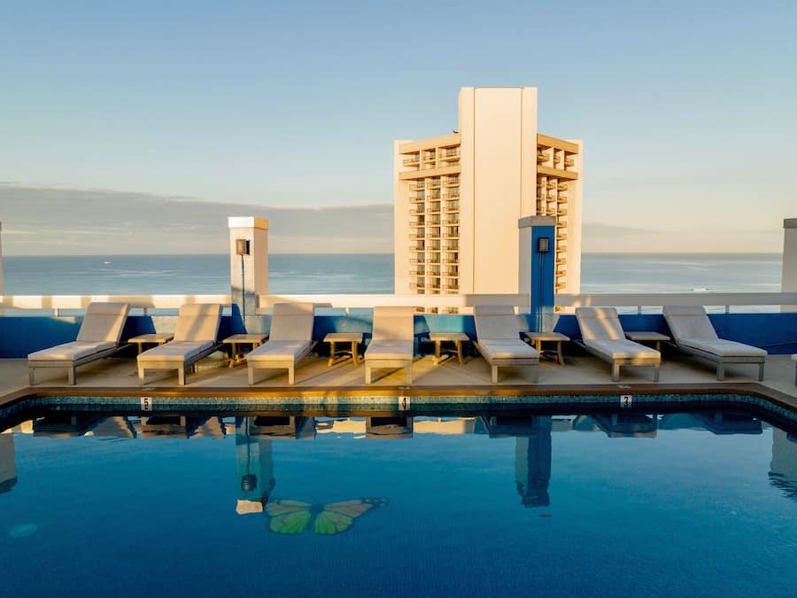 Outdoor pool, open 6:00 AM to 10:00 PM, sun loungers