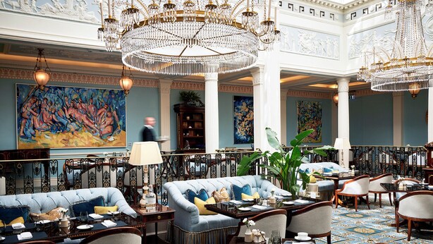 A spacious lobby with a grand chandelier, plush seating, and ornate decor. - The Lanesborough, Oetker Hotels (London)