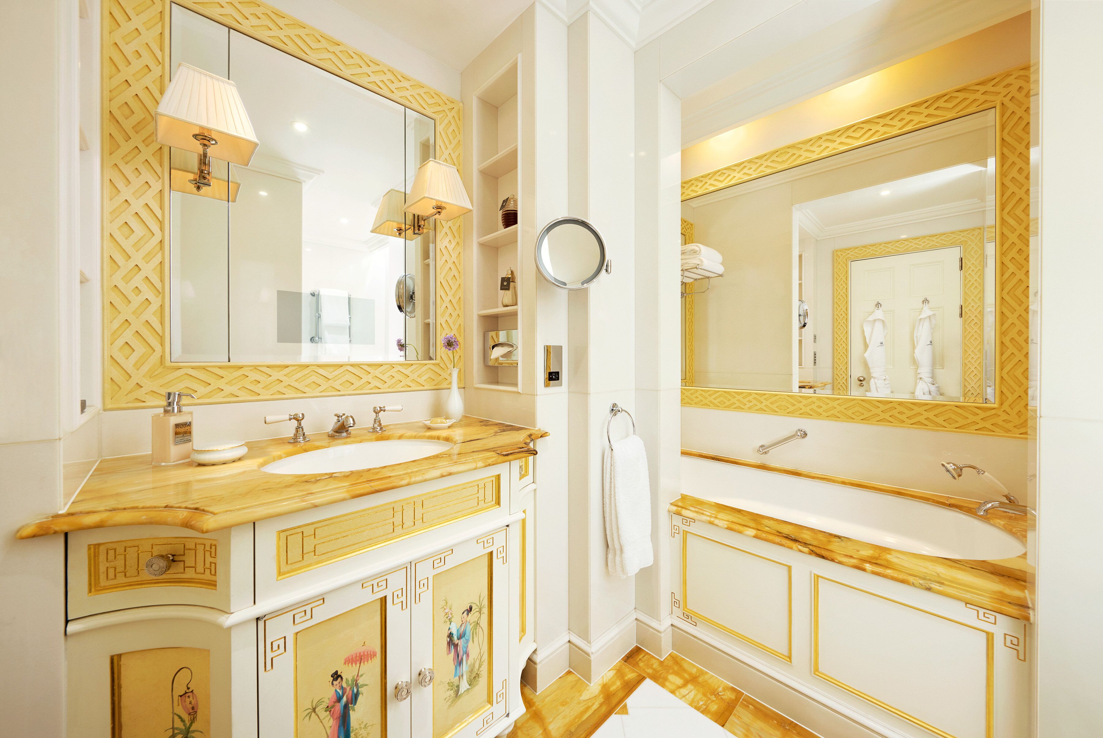 designer toiletries, hair dryer, bathrobes, slippers