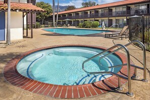 2 outdoor pools, open 9:00 AM to 10:00 PM, pool loungers - FOUND Hotels, Santa Barbara, Series by Marriott (Santa Barbara)