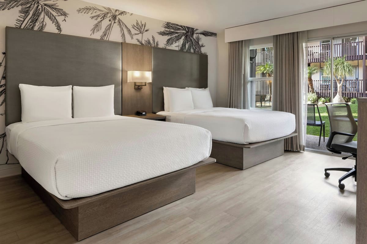 Deluxe Room, 2 Queen Beds, Courtyard View | Hypo-allergenic bedding, in-room safe, desk, laptop workspace