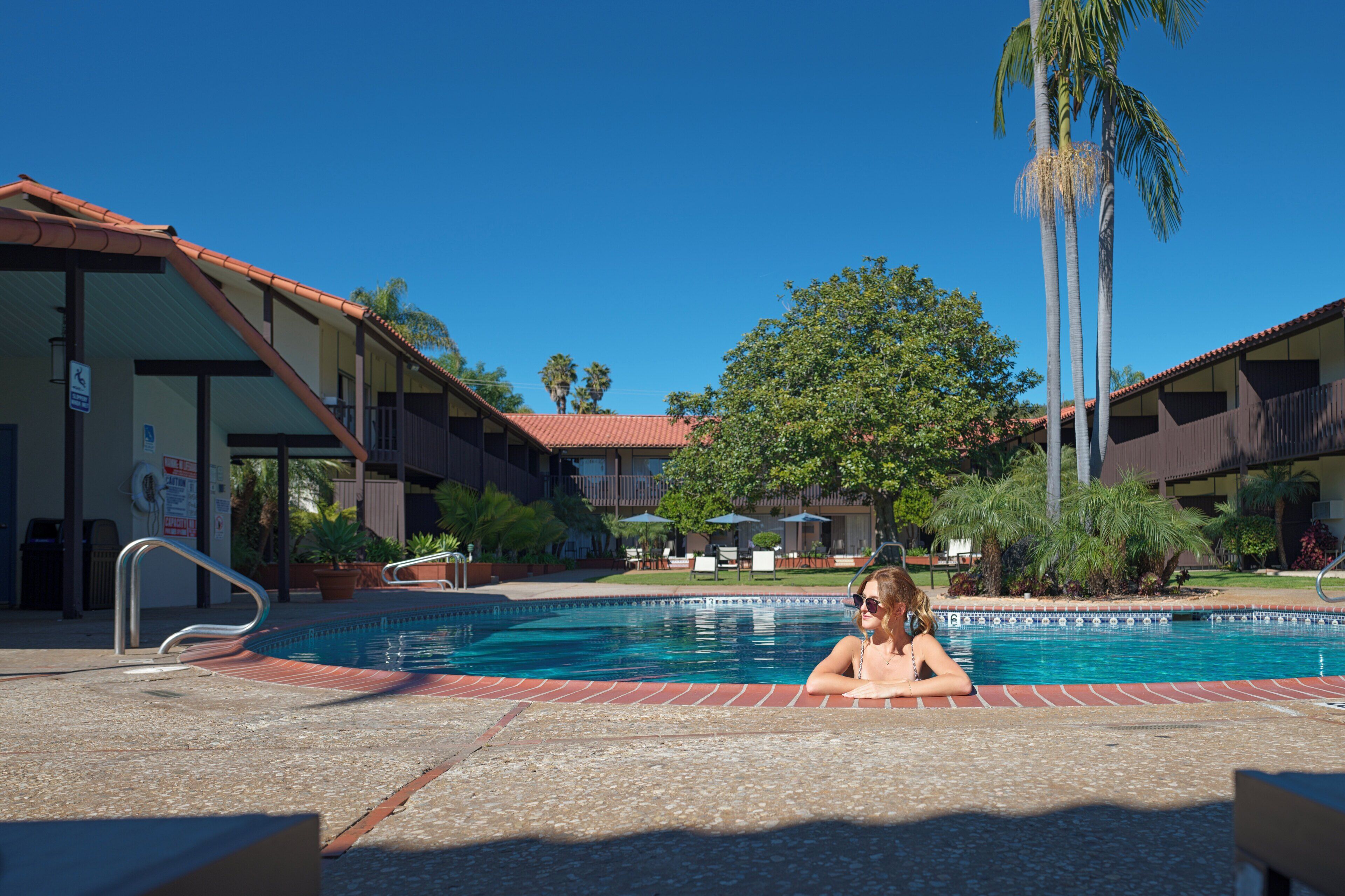 2 outdoor pools, open 9:00 AM to 10:00 PM, pool loungers