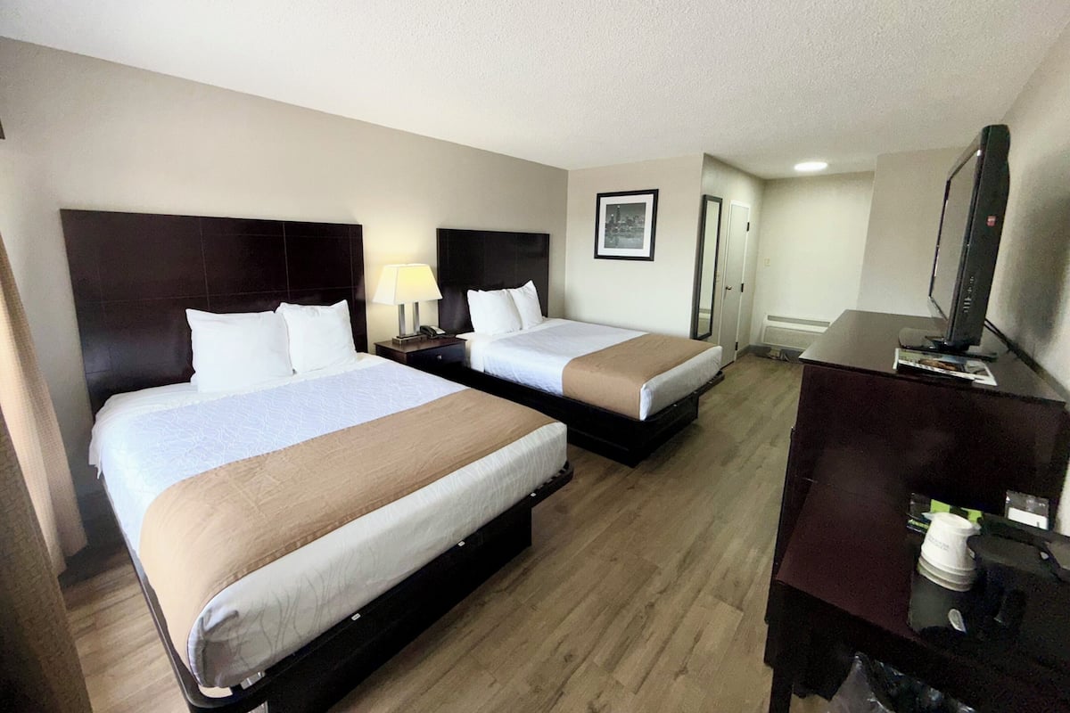 Room, 2 Queen Beds, Non Smoking | Desk, laptop workspace, iron/ironing board, bed sheets