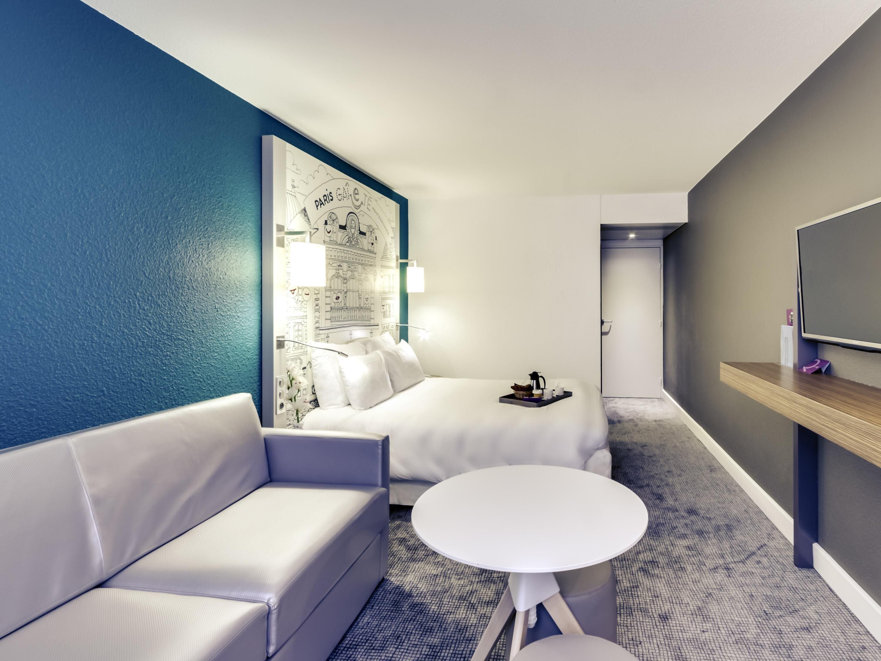 Standaard kamer, 1 tweepersoonsbed met slaapbank | Luxe beddengoed, pillowtop-bedden, een minibar, een kluis op de kamer