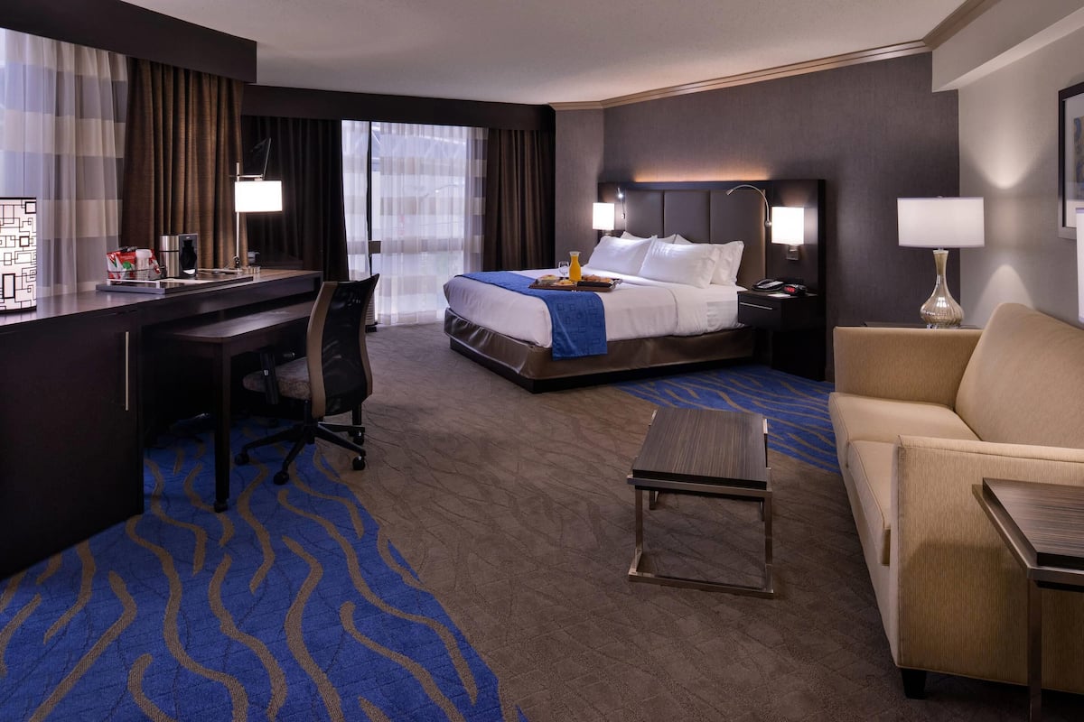 Hypo-allergenic bedding available, down comforters, in-room safe, desk