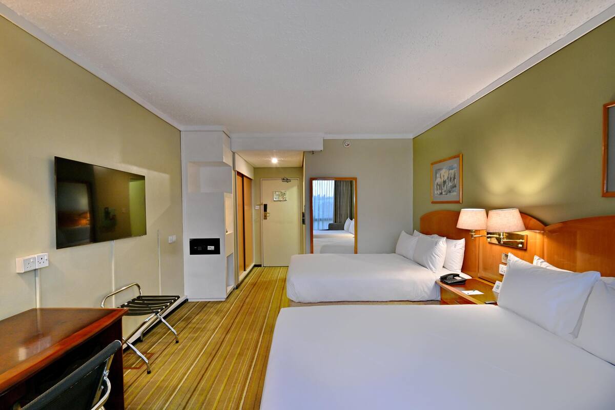 Premium bedding, down duvets, in-room safe, desk