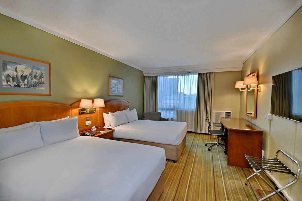 Premium bedding, down duvets, in-room safe, desk