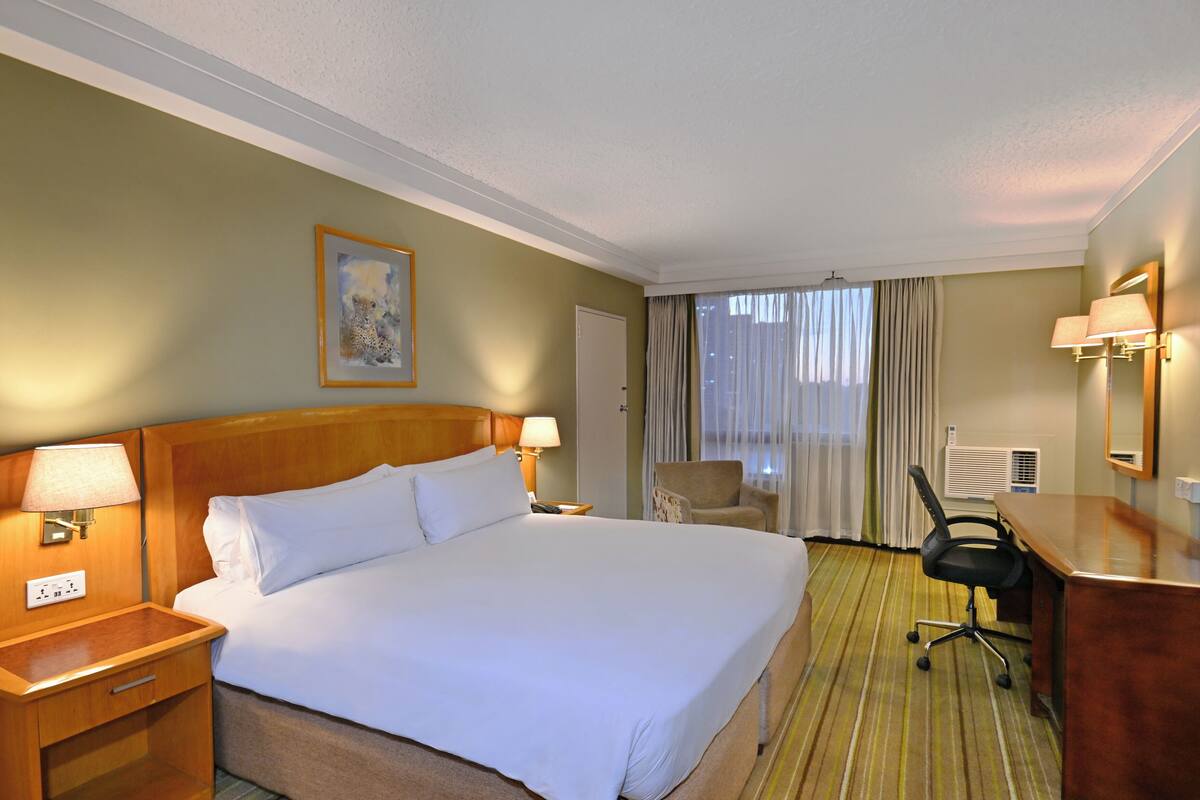 Premium bedding, down duvets, in-room safe, desk