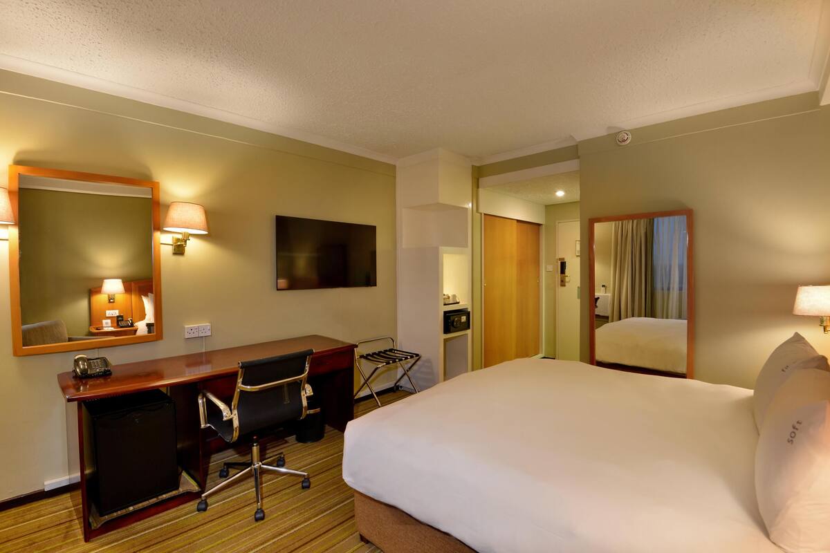 Premium bedding, down duvets, in-room safe, desk