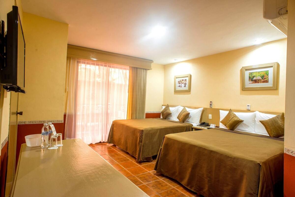 Premium bedding, down duvets, in-room safe, desk
