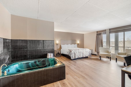 Superior Room, 1 King Bed, Non Smoking, Jetted Tub | 1 bedroom, blackout drapes, free WiFi, bed sheets