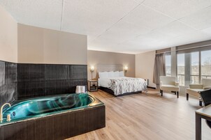 Superior Room, 1 King Bed, Non Smoking, Jetted Tub | 1 bedroom, blackout drapes, free WiFi, bed sheets