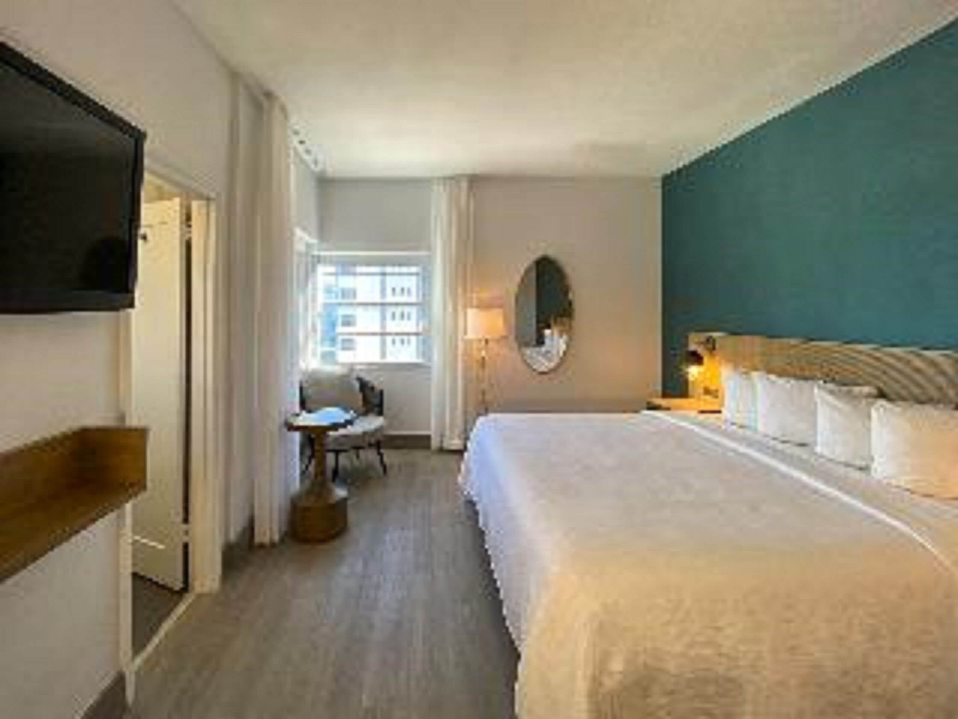 Premium bedding, pillow-top beds, in-room safe, laptop workspace