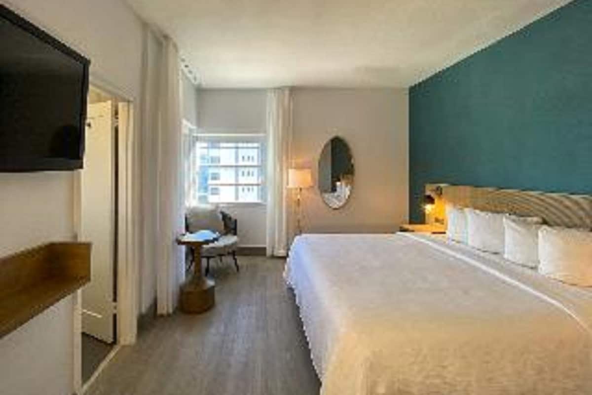 Premium bedding, pillow-top beds, in-room safe, laptop workspace