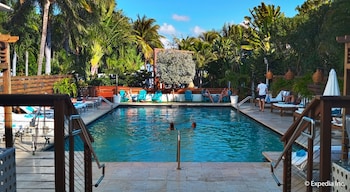 Outdoor pool, open 8 AM to 8 PM, cabanas (surcharge), pool umbrellas at Marseilles Beachfront Hotel